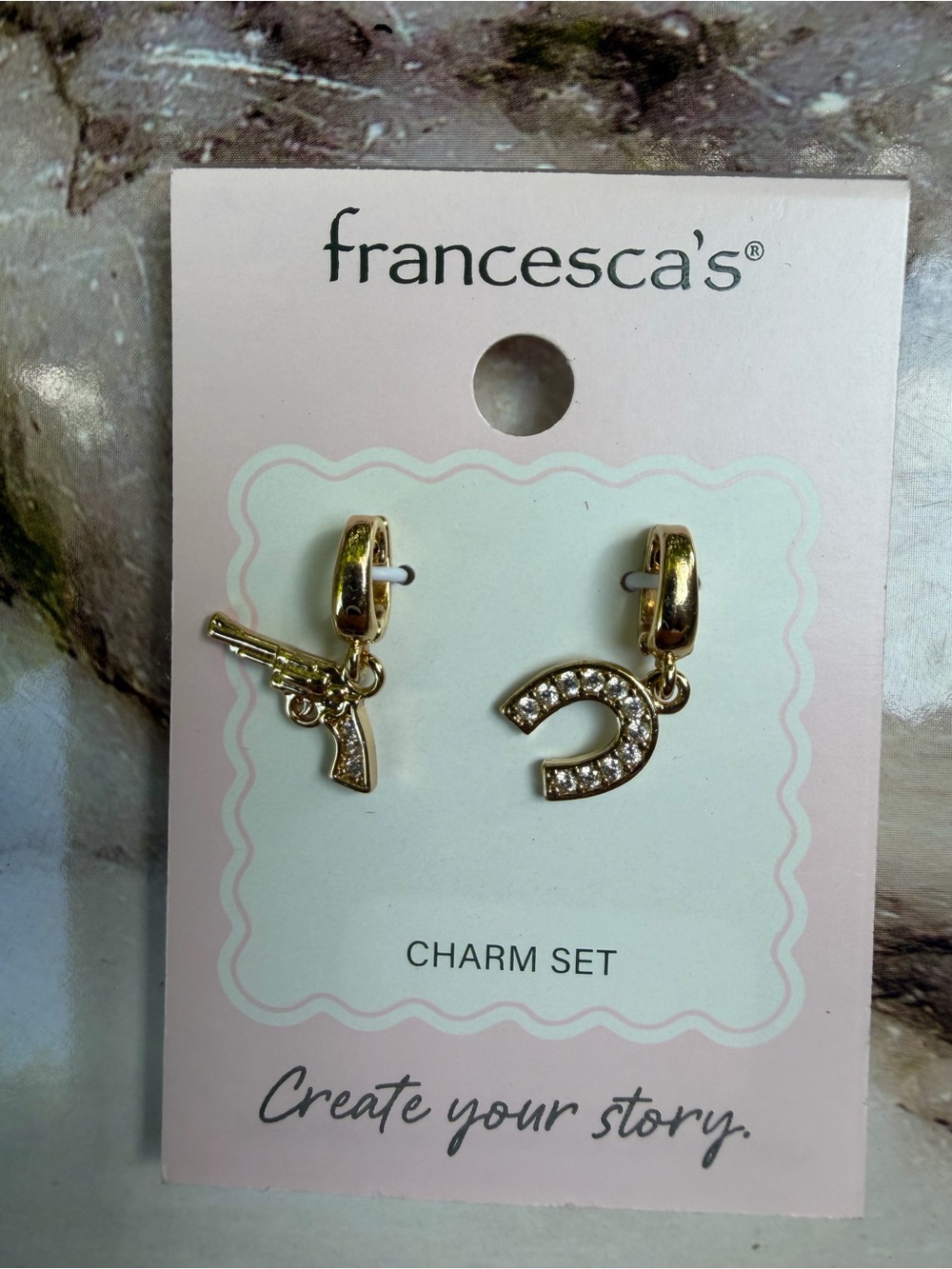 Francesca's Collections Gold Rhinestone Horseshoe & Pistol Charm Set